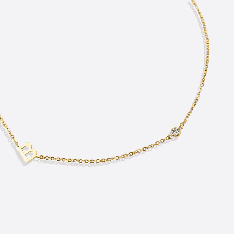 Initialkjede med diamantdetalj