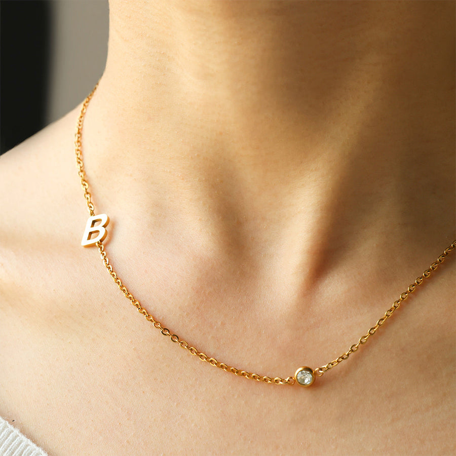 Initialkjede med diamantdetalj