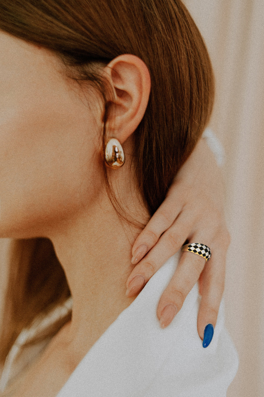 Ring med sjakkrutemønster