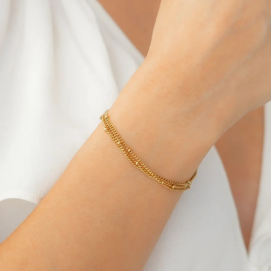 Tredubbelt armband med satellitkedja