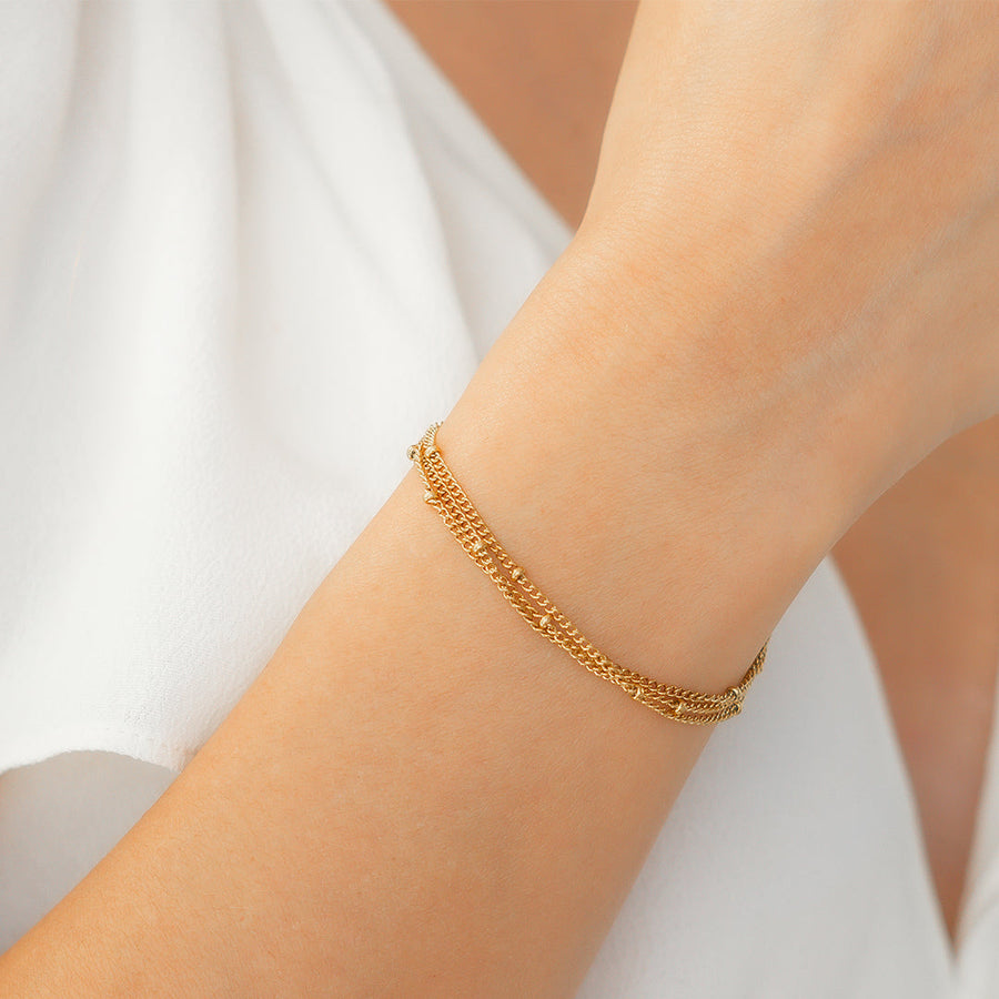Tredubbelt armband med satellitkedja