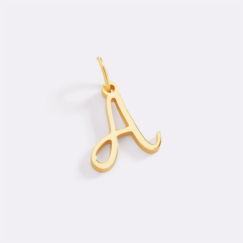 Berlock med kursiv initial
