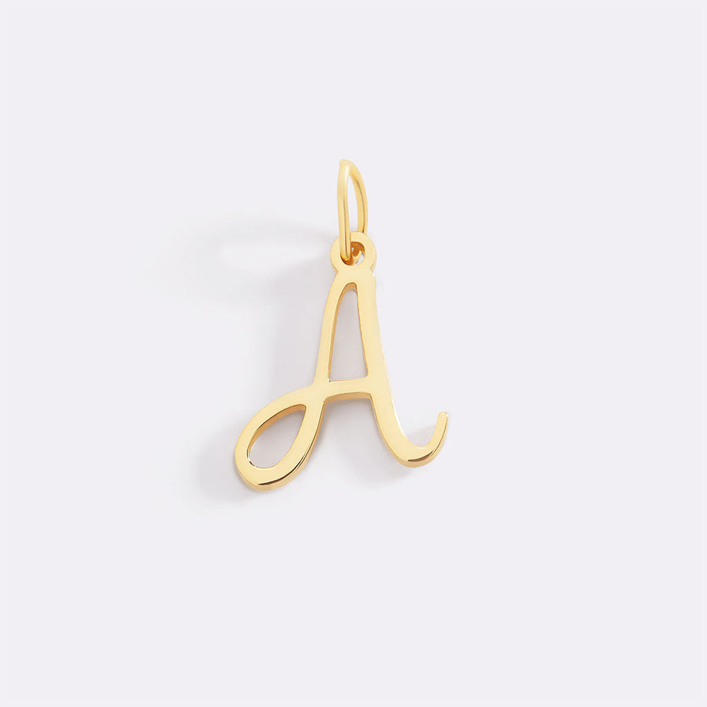 Berlock med kursiv initial
