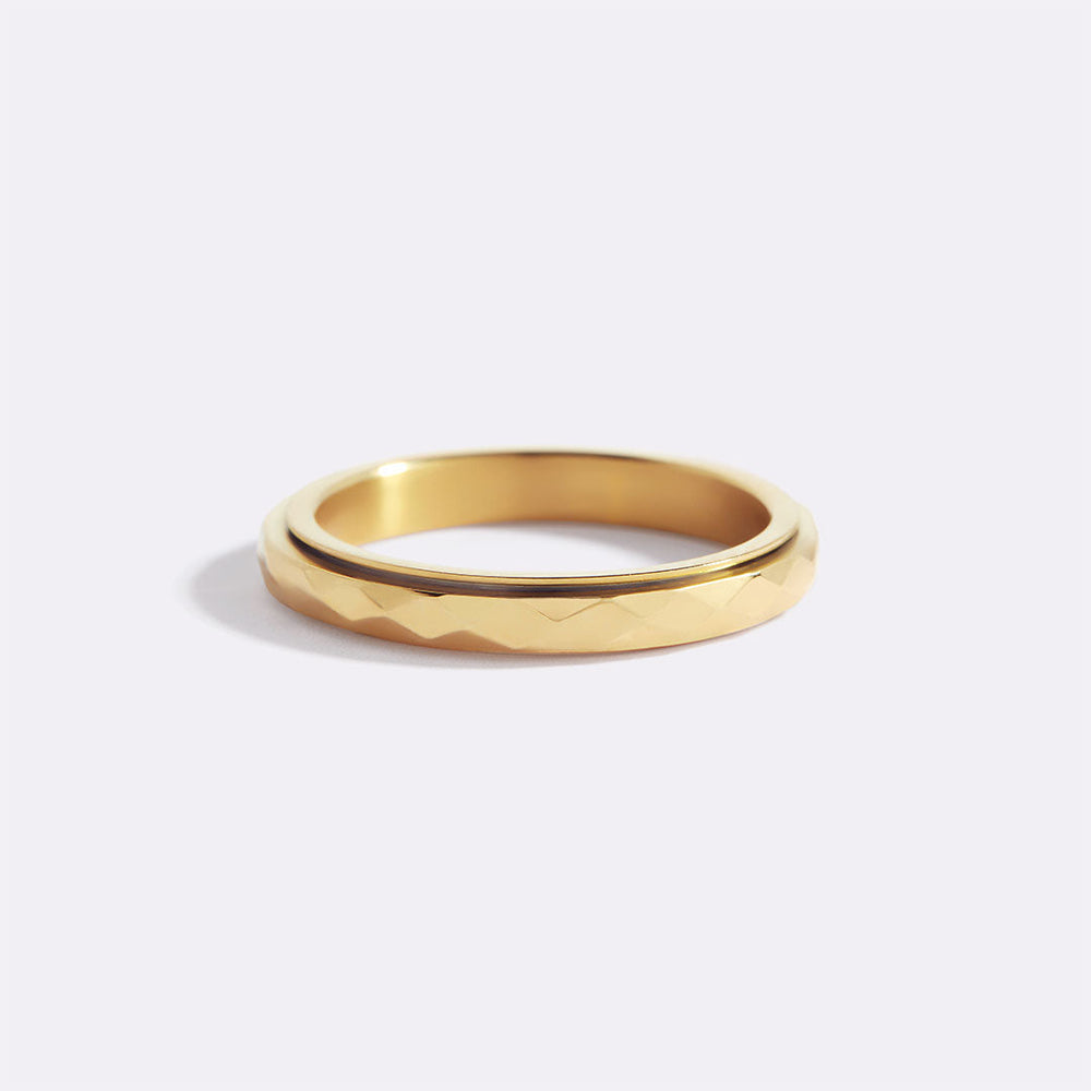 Delikat hamret snurrende fidget-ring