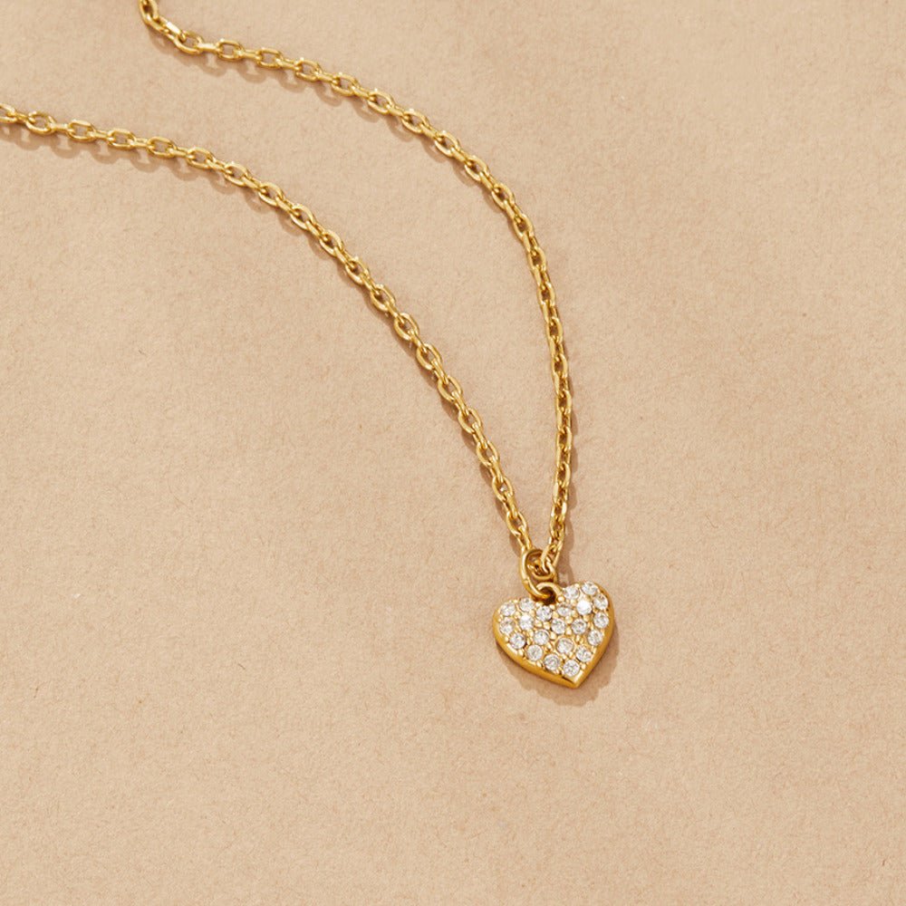 Halsband med hjärthänge guld
