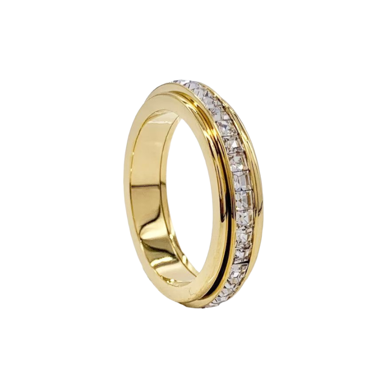 Markant snurrende fidget-ring med krystall