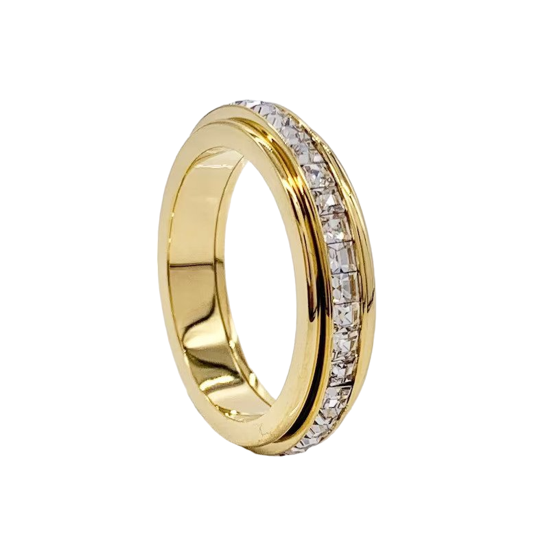Markant snurrende fidget-ring med krystall