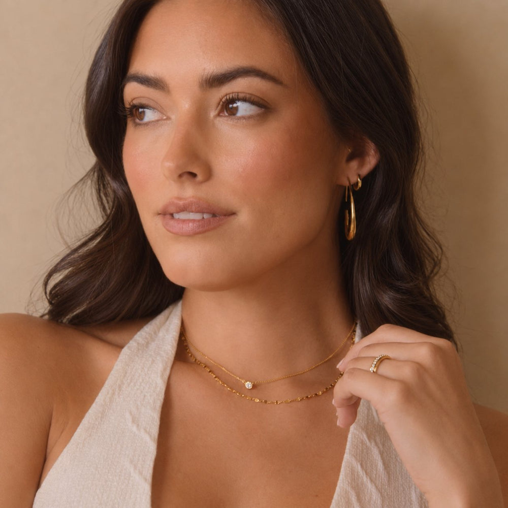 Boucles d'oreilles créoles fluides