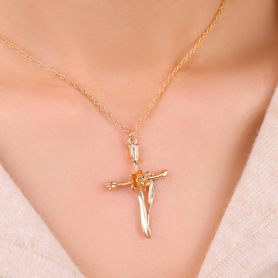 Halsband med blomsterkorshänge