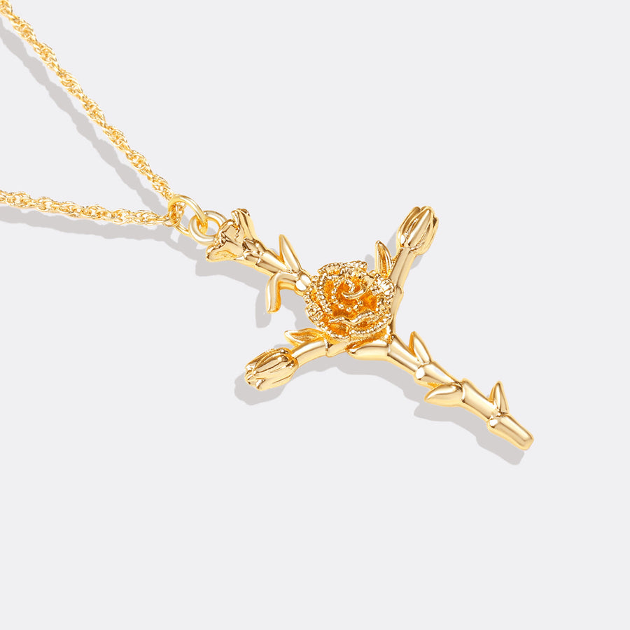 Halsband med blomsterkorshänge