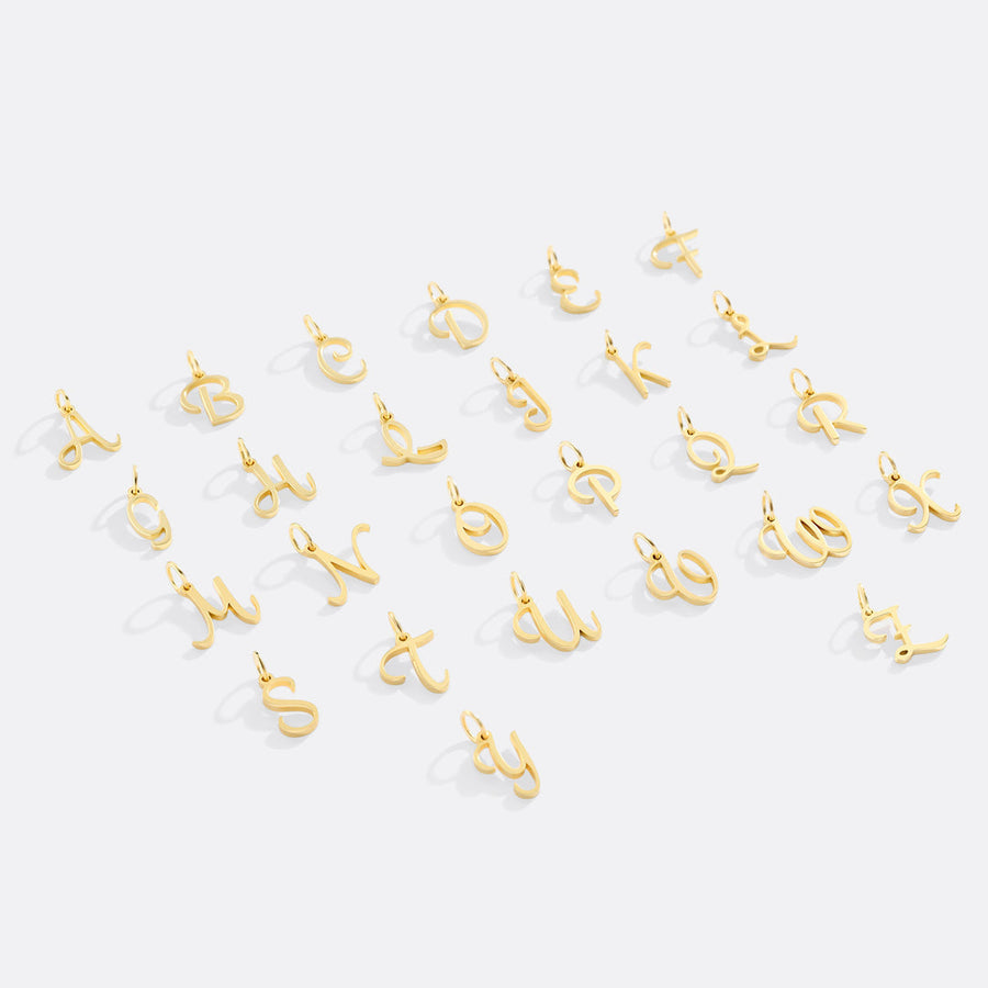 Berlock med kursiv initial