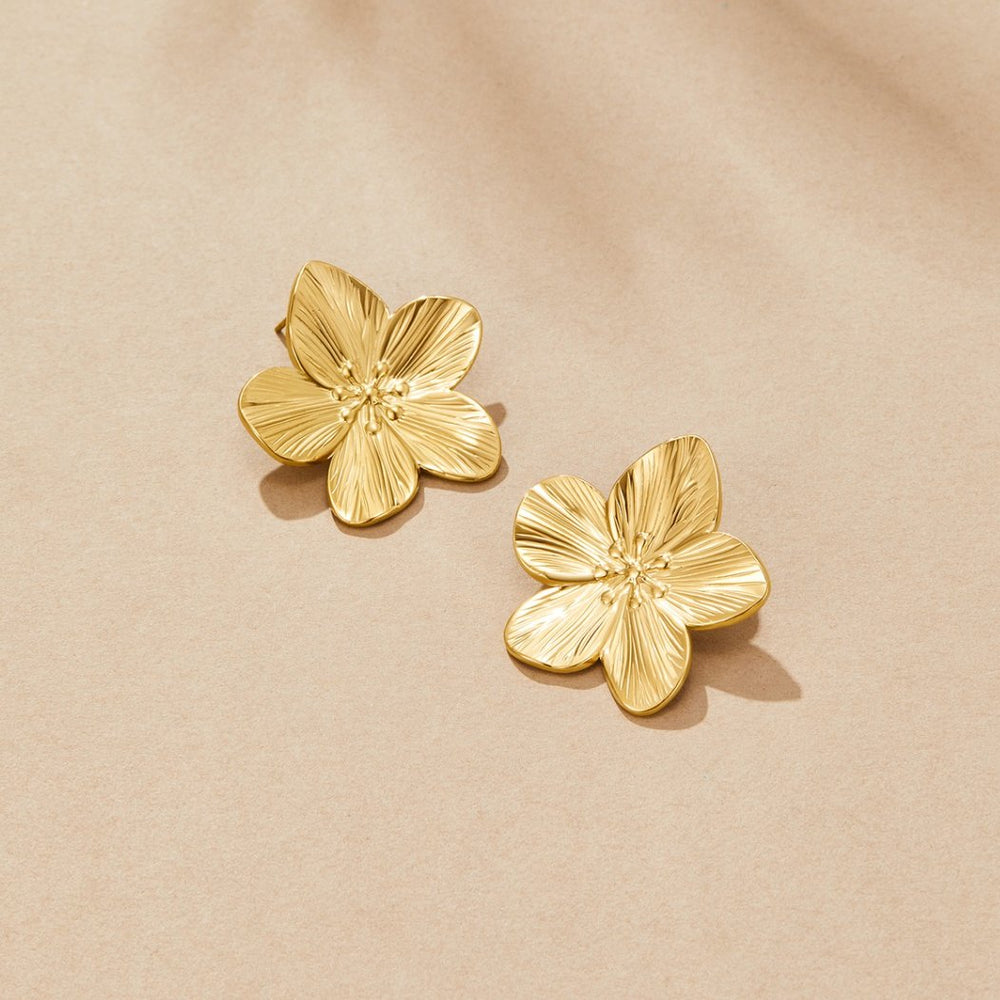 Blomformade örhängen guld – bild 3