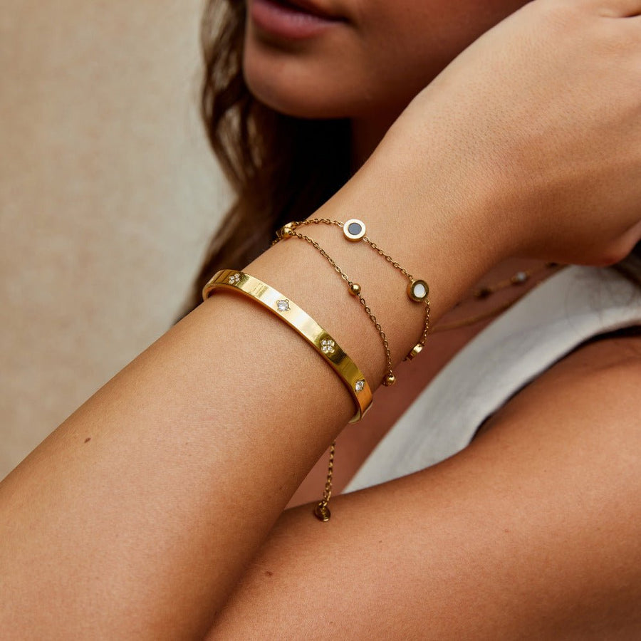 Gullfarget kløverarmring