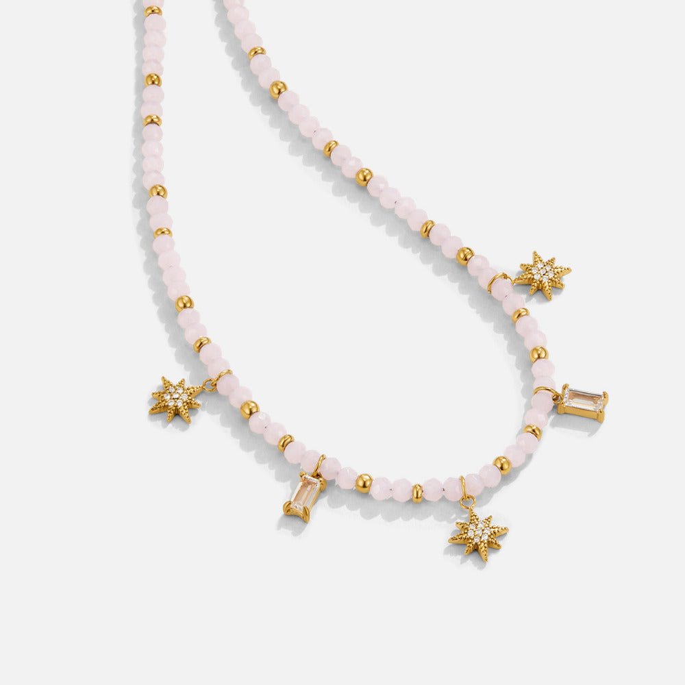 Lana halskjede med rosa perler og gullbelagt rustfritt stål