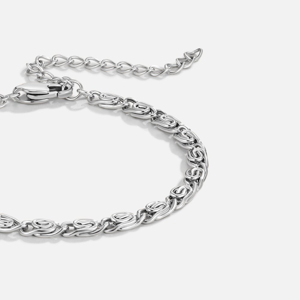 Sølvfarget armbånd med spiralledd – bilde 3