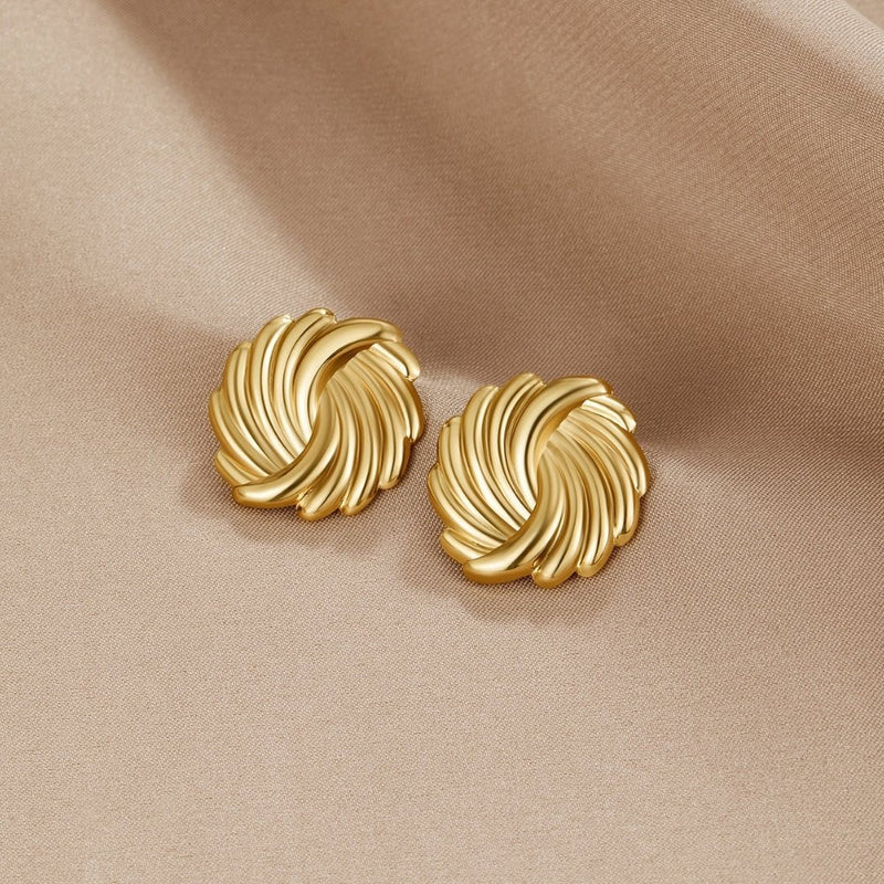 Spiralörhängen guld