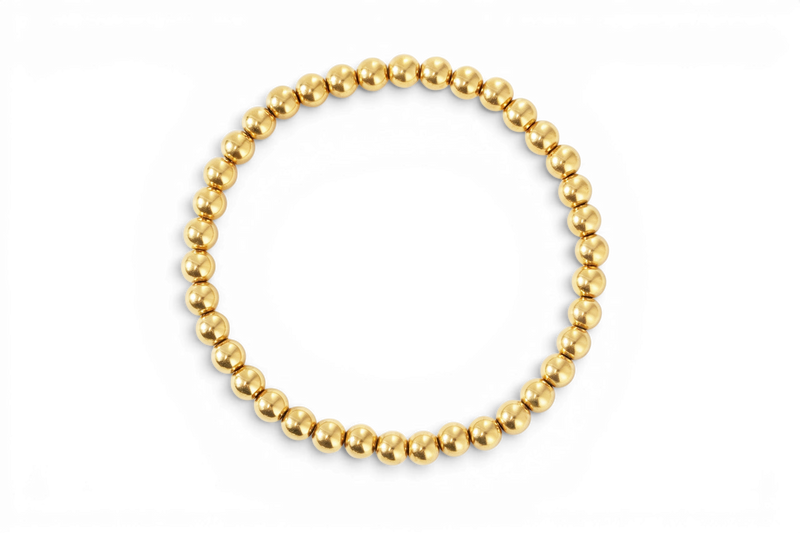 Bracelet à perles dorées délicat