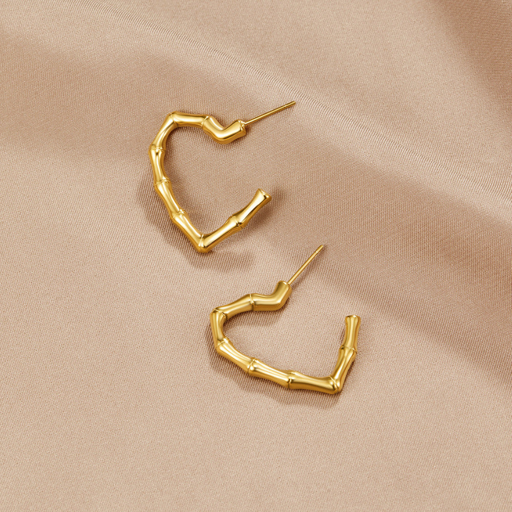 Gullfargede Eternal Love hoops i rustfritt stål