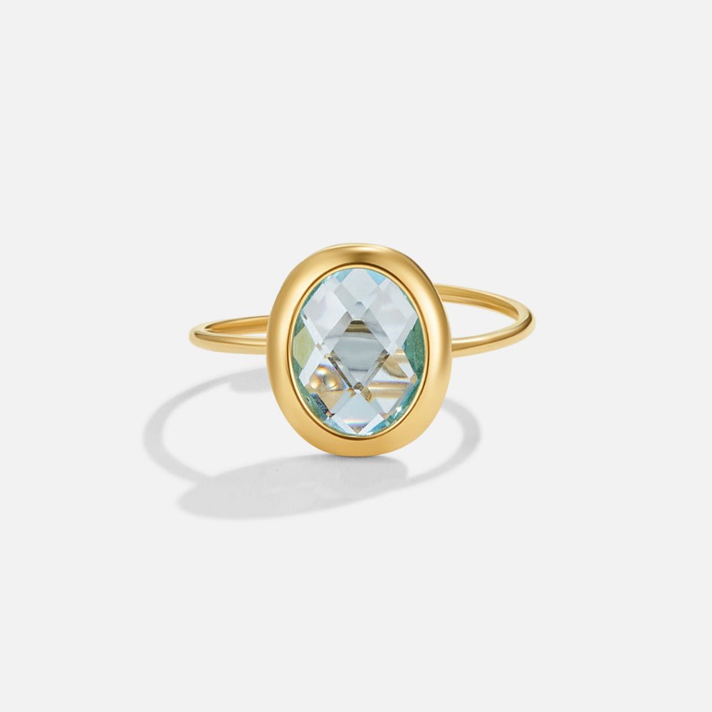 Justerbar ring med akvamarinblå zirkonia guld