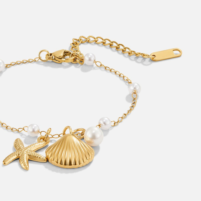 Aria berlockarmband med snäcka