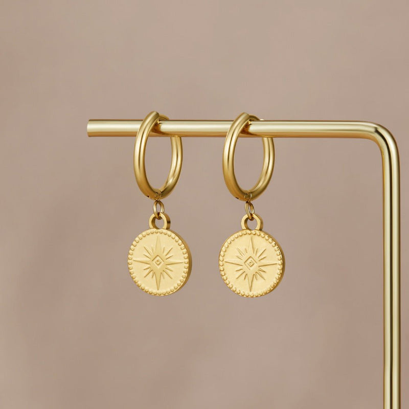 Celestial medaljongörhängen guld