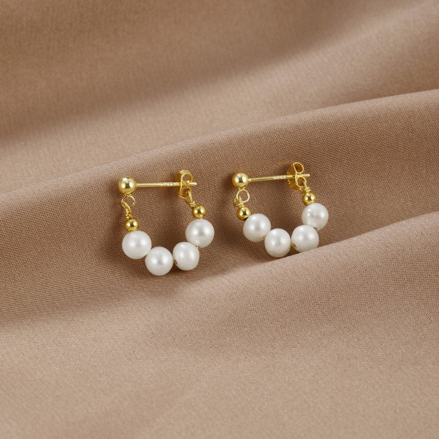Celine gullfargede hoops med perle
