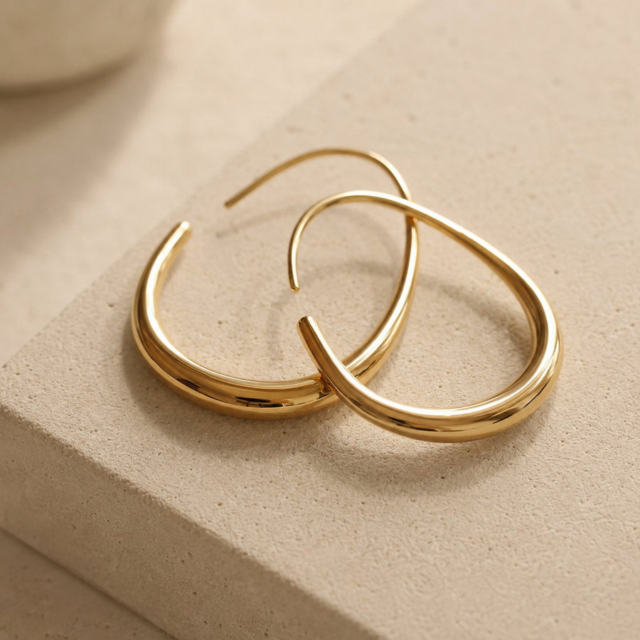 Boucles d'oreilles créoles fluides