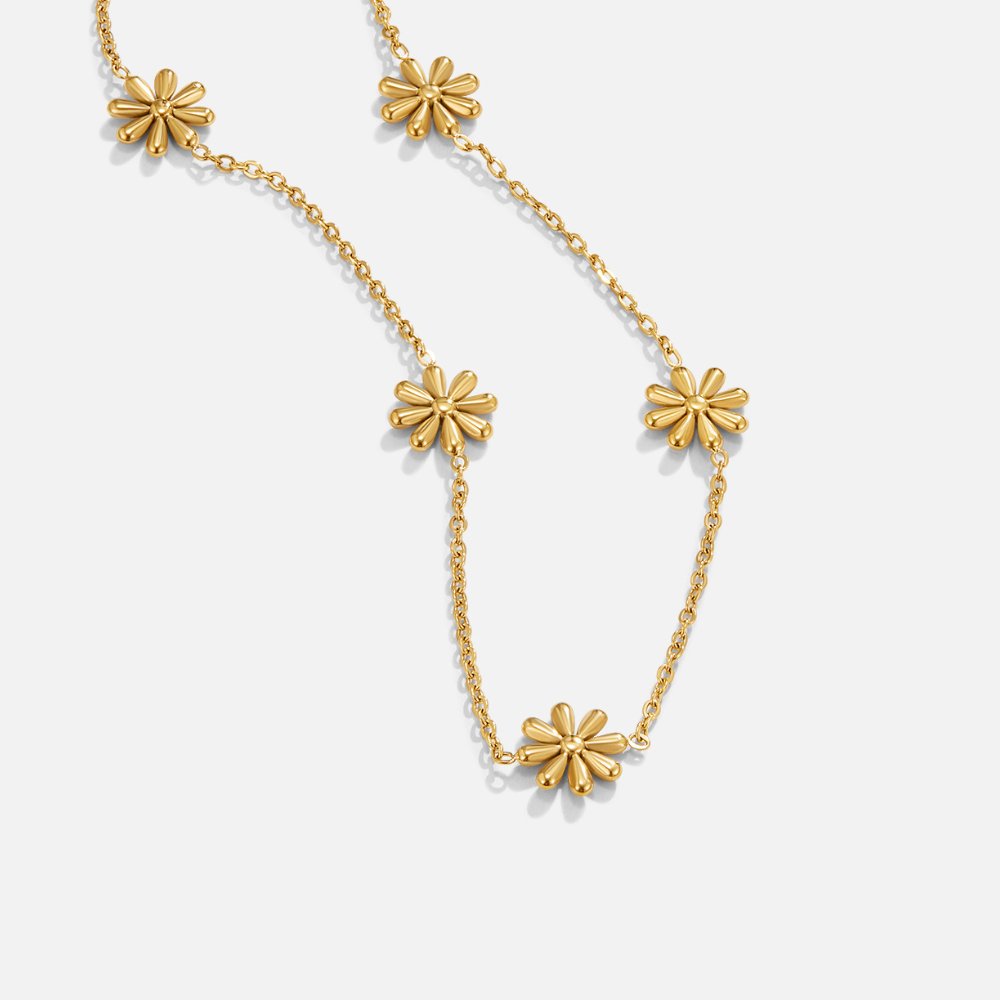 Halsband med små blommor guld