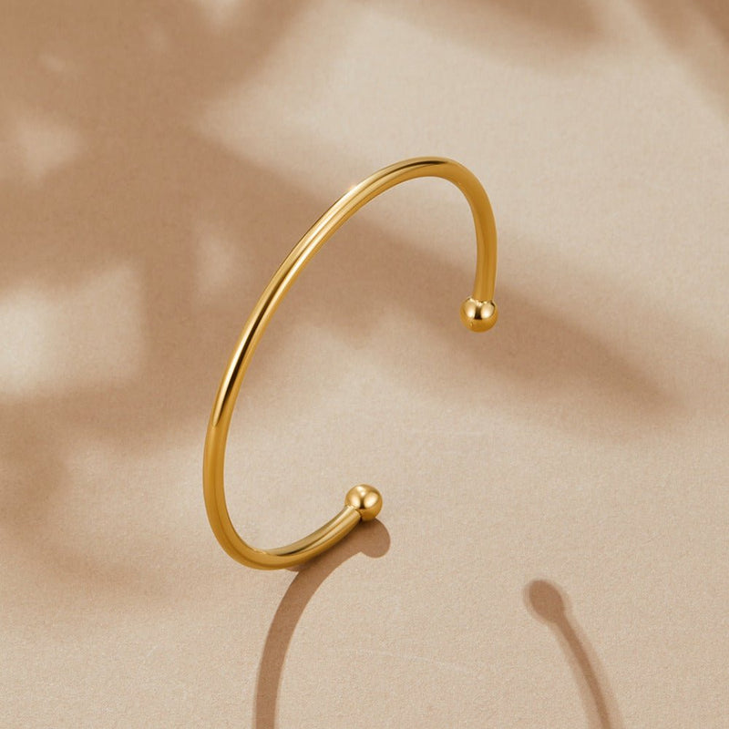 Penelope guldfärgad armring