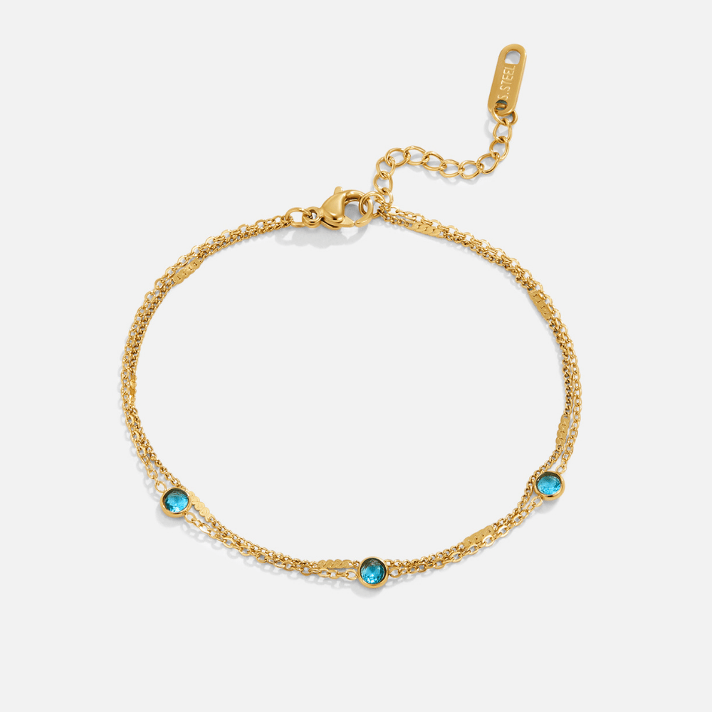 Athena gullfarget lagdelt armbånd med blå krystall – bilde 4