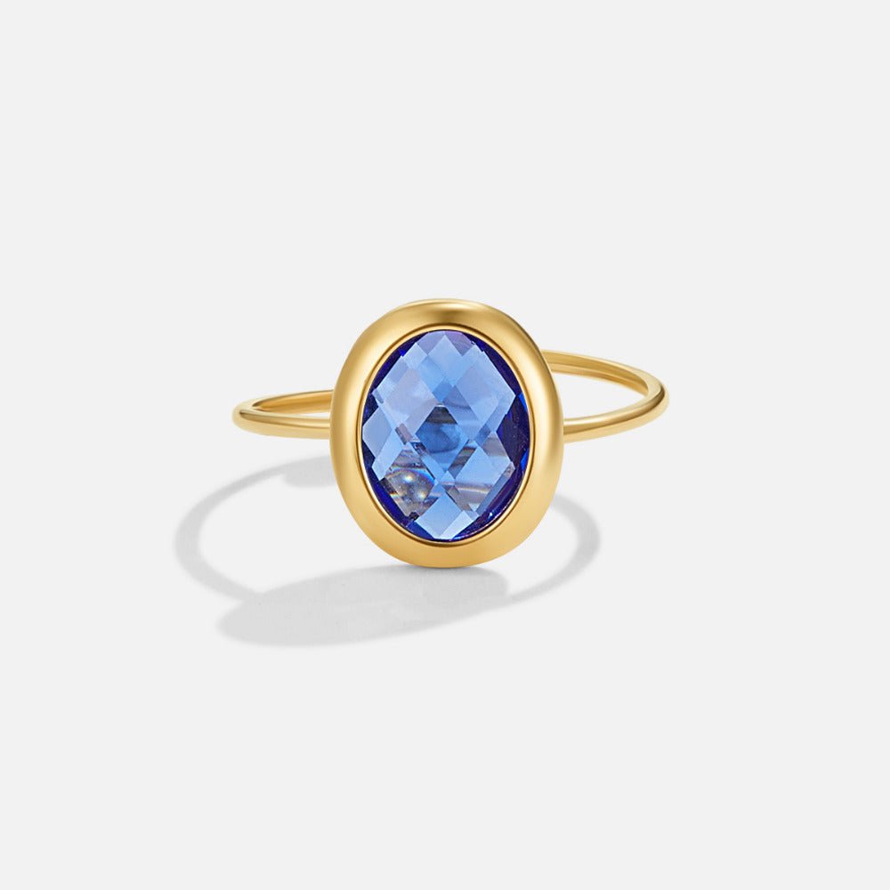 Justerbar ring med safirblå zirkonia guld