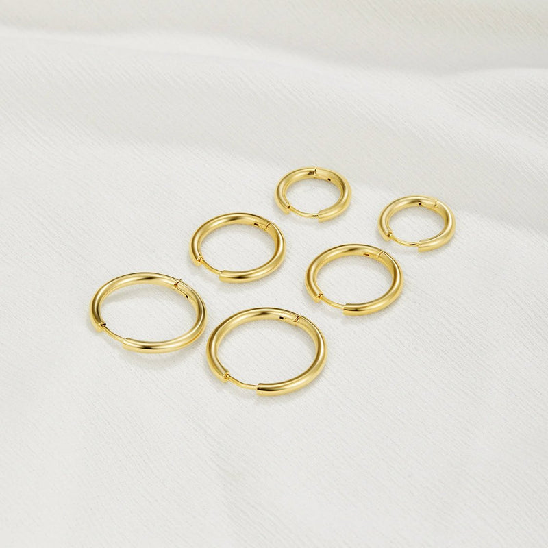 Sett med tre ringøredobber