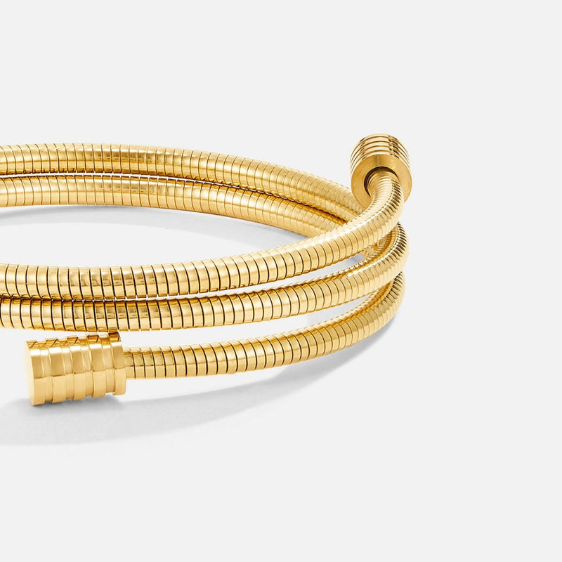 Gullfarget tvunnet armbånd